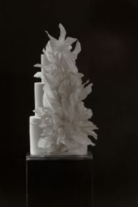 Modern wedding cake with sculpted edible petals in an artistic, high-fashion design. Exceptional Wedding Cakes Loughborough